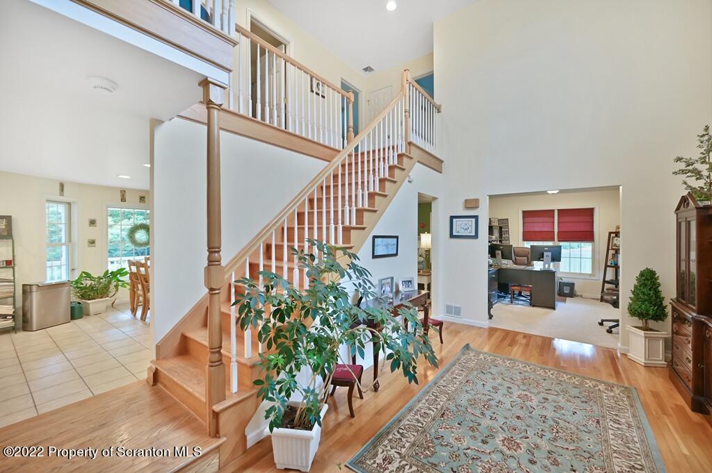 47 Wildernest Road Moscow, PA 18444 - Photo 8 of 40 a view of an entryway and hall with wooden floor