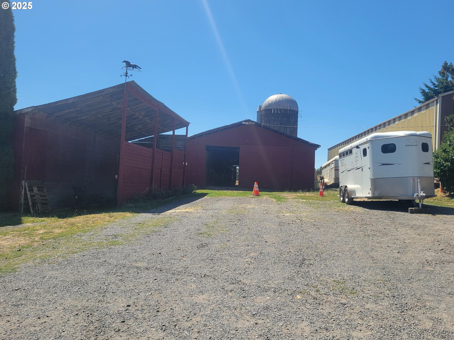 32650 Oester Road Warren, OR 97053 - Photo 23 of 43 a view of a house with a yard