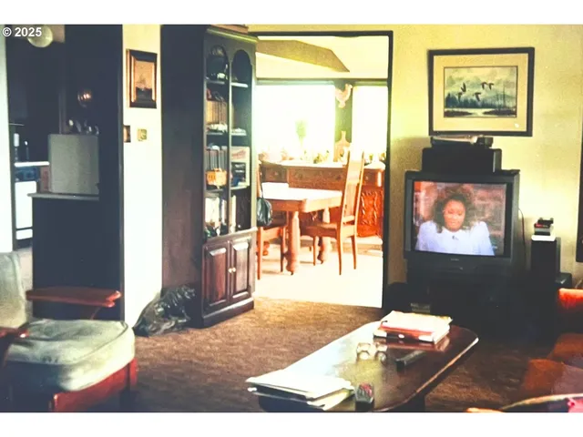 a bedroom with a bed and a view of bedroom