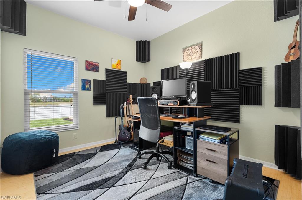 2780 Orange Grove Trail Naples, FL 34120 - Photo 16 of 29 Office space with light wood-style floors and a ceiling fan