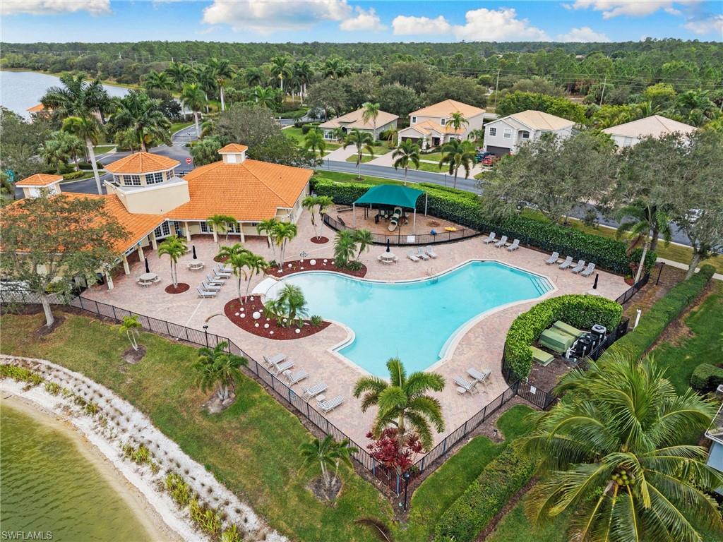 2780 Orange Grove Trail Naples, FL 34120 - Photo 28 of 29 Aerial view of a nearby body of water and a pool area