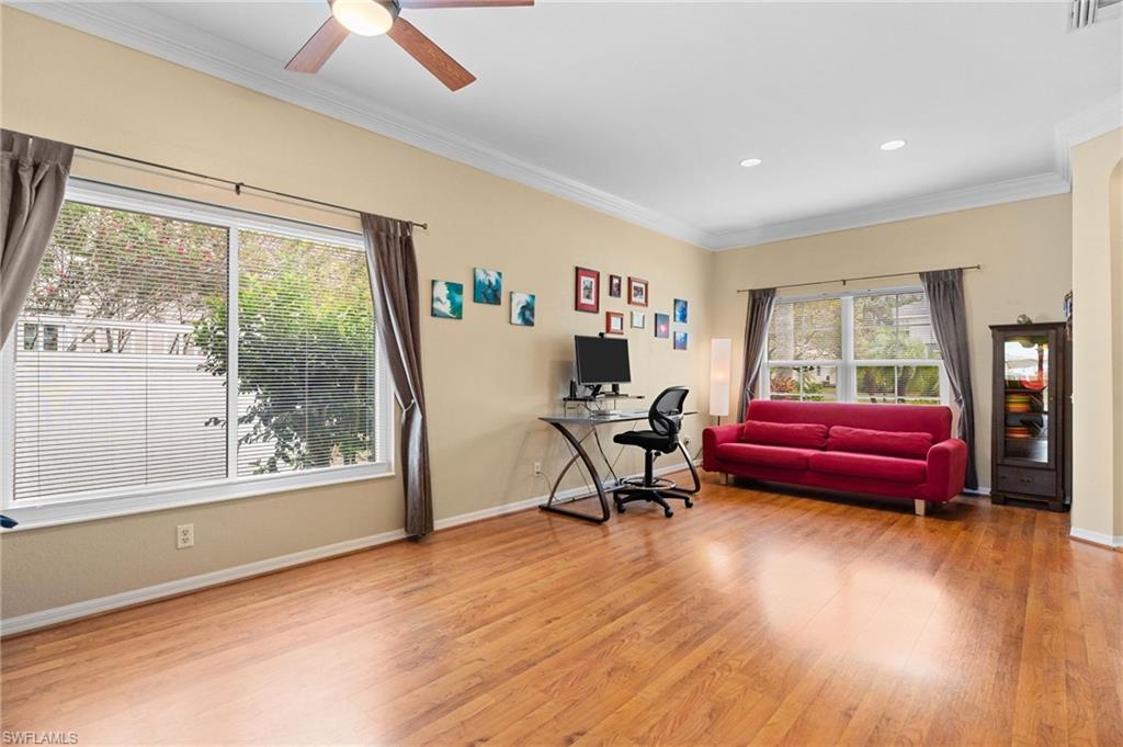 2780 Orange Grove Trail Naples, FL 34120 - Photo 4 of 29 Office with crown molding, light wood-style floors, and ceiling fan