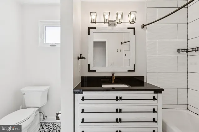 a bathroom with a sink and a toilet