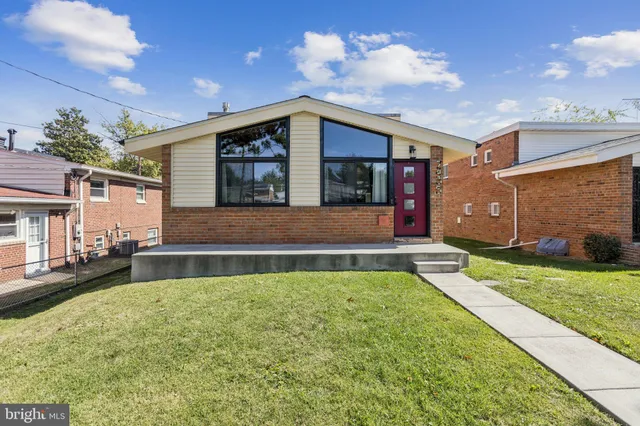 a view of swimming pool with a yard