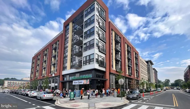 a front view of a building with street view