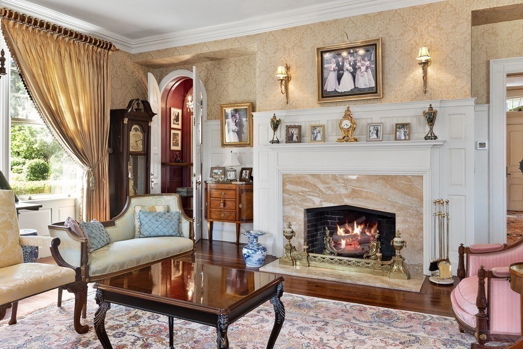 59 Walnut Road Wenham, MA 01984 - Photo 11 of 39 a living room with furniture and a fireplace