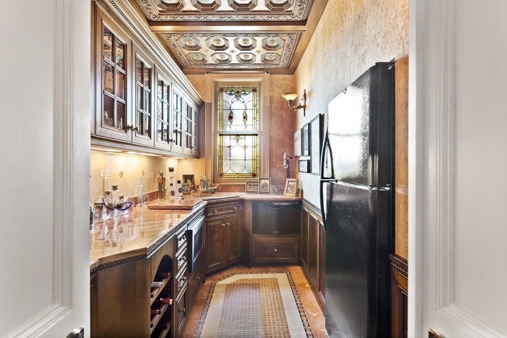 59 Walnut Road Wenham, MA 01984 - Photo 14 of 39 a kitchen with a refrigerator and countertop