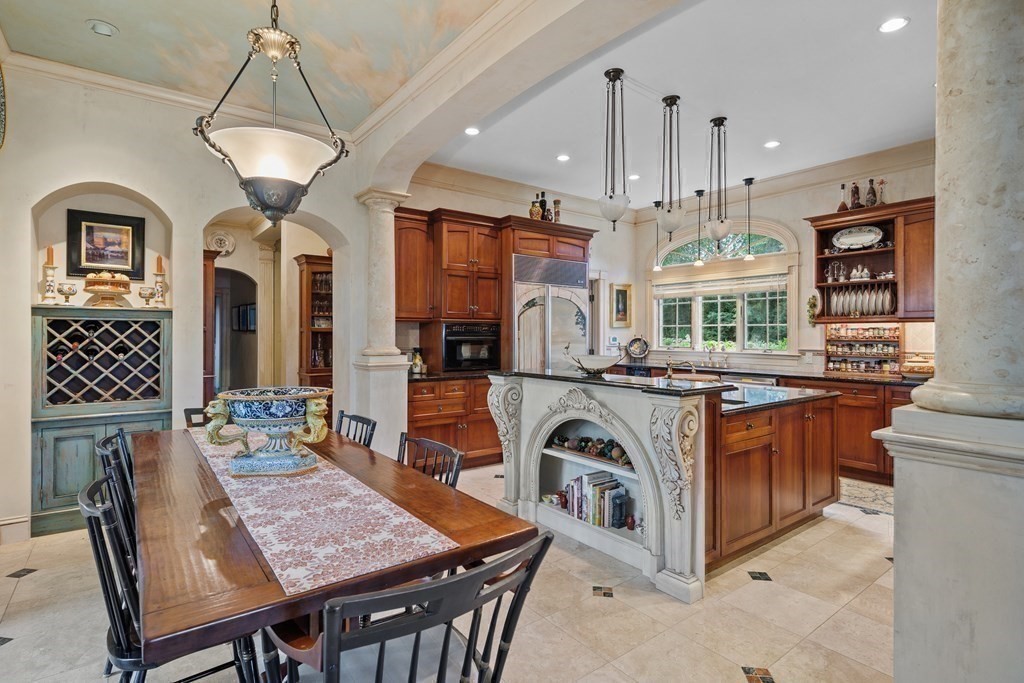 59 Walnut Road Wenham, MA 01984 - Photo 18 of 39 a view of a dining room with furniture and chandelier