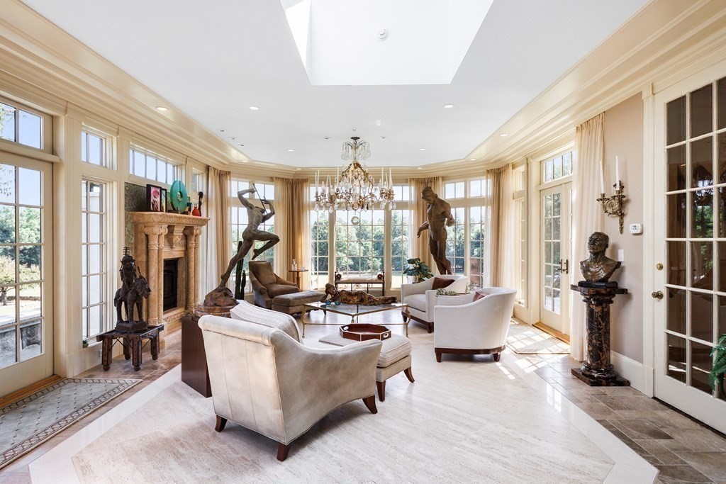 59 Walnut Road Wenham, MA 01984 - Photo 22 of 39 a living room with fireplace furniture and a large window