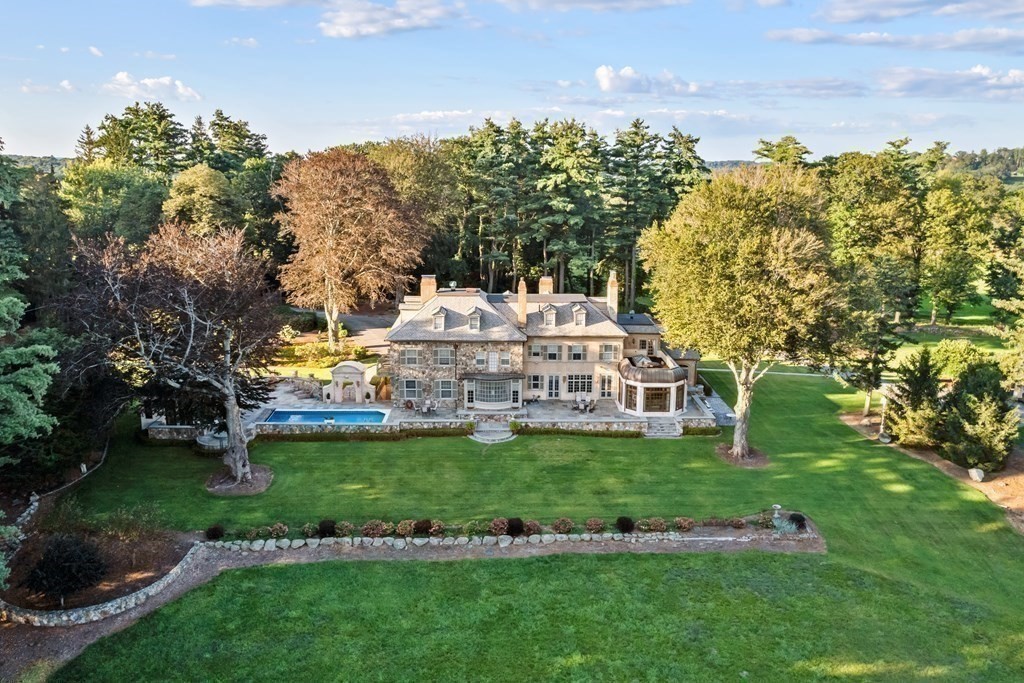 59 Walnut Road Wenham, MA 01984 - Photo 26 of 39 a view of a big yard next to a building with a yard