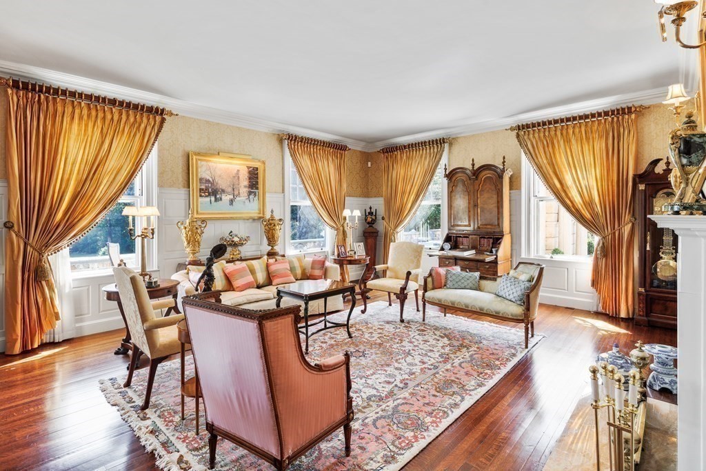 59 Walnut Road Wenham, MA 01984 - Photo 10 of 39 a living room with fireplace furniture and a large window