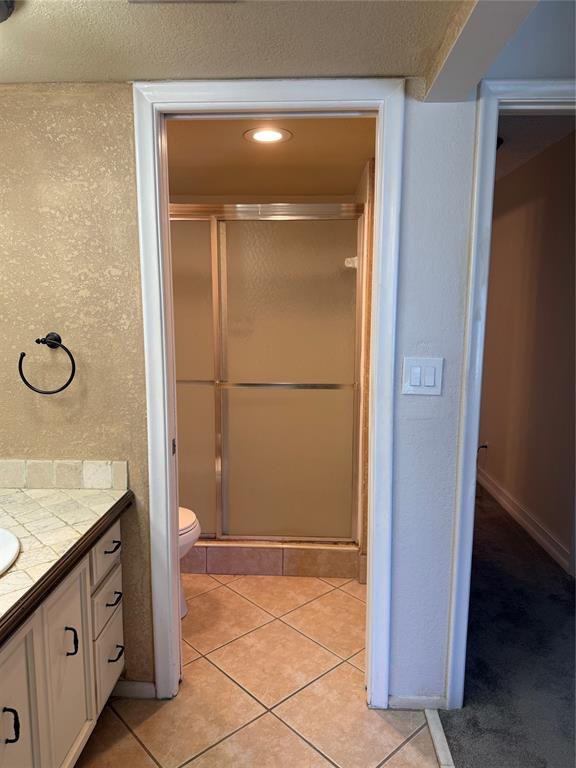 2302 Bridgewood Drive, Unit 2302 Boca Raton, FL 33434 - Photo 17 of 20 a bathroom with a granite countertop sink and a mirror