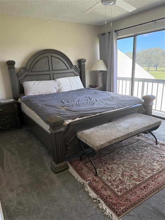 2302 Bridgewood Drive, Unit 2302 Boca Raton, FL 33434 - Photo 10 of 20 a bedroom with a bed a mirror and windows