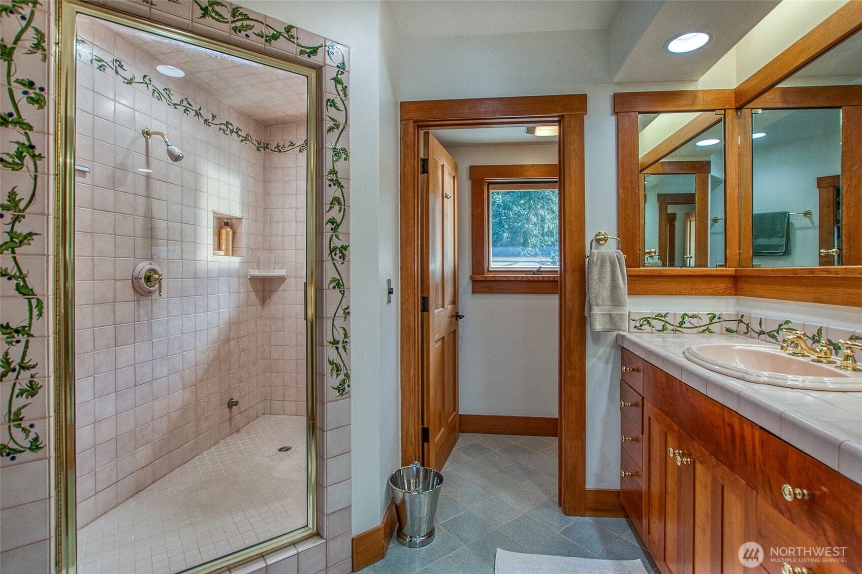 285 Raptor Road Orcas Island, WA 98245 - Photo 14 of 40 a bathroom with a tub shower sink and mirror