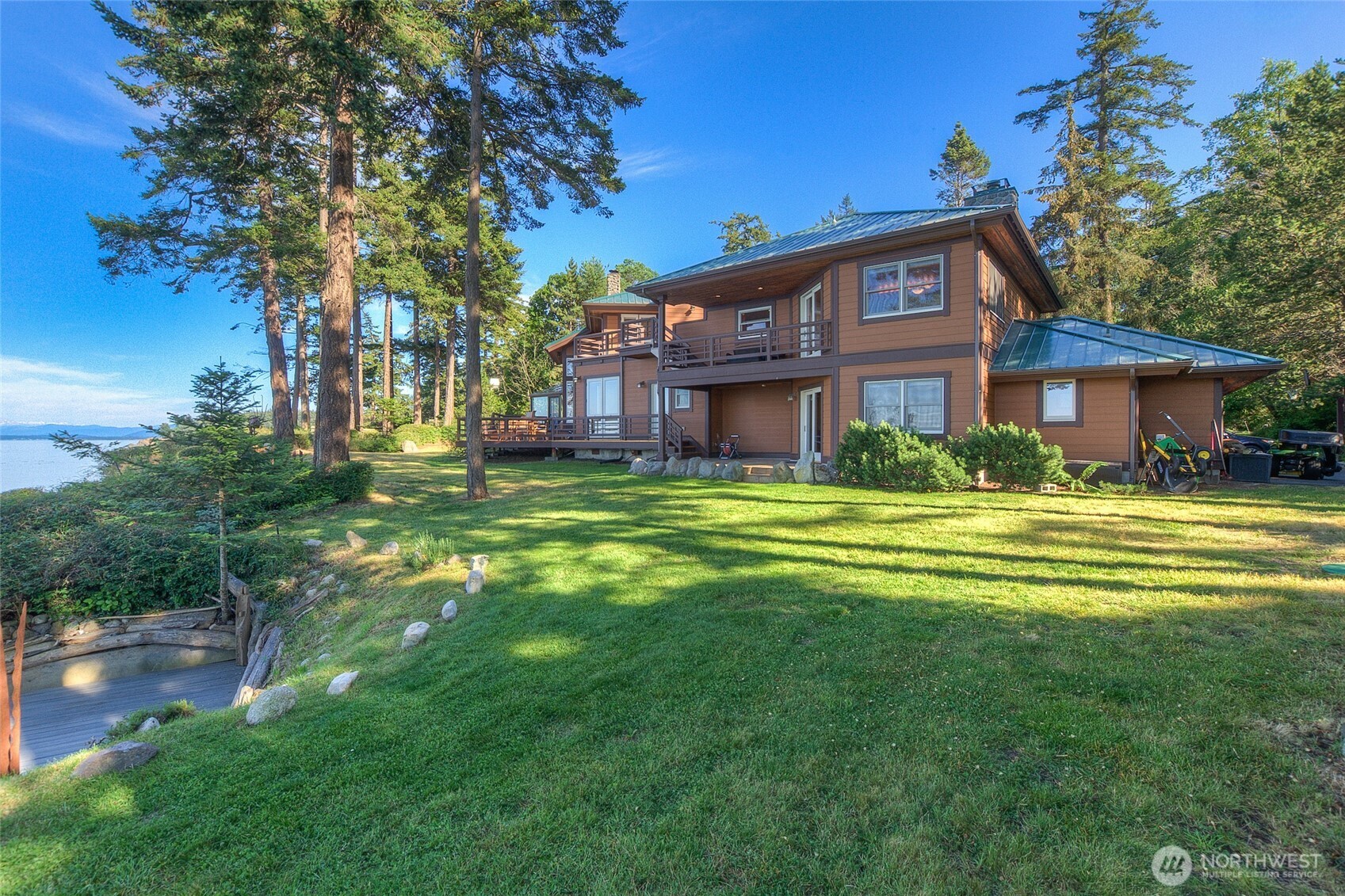 285 Raptor Road Orcas Island, WA 98245 - Photo 30 of 40 a view of a house with a big yard
