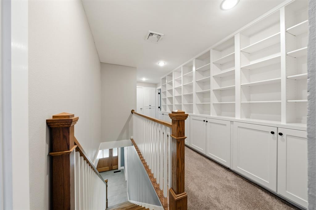 1122 West White Oak Road West, TX 76691 - Photo 19 of 33 Upstaris landing w custom cabinets