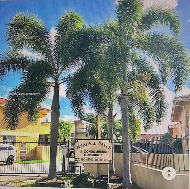 13904 Southwest 65th Terrace, Unit 8 Miami, FL 33183 - Photo 1 of 24 a view of a palm trees front of palm trees