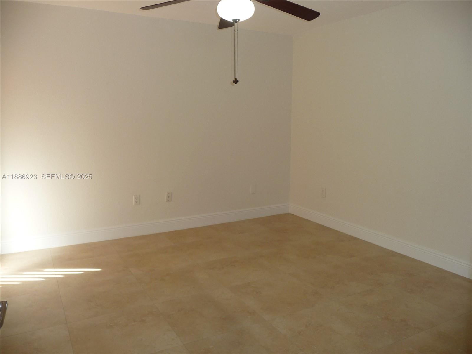 13904 Southwest 65th Terrace, Unit 8 Miami, FL 33183 - Photo 13 of 24 a view of an empty room