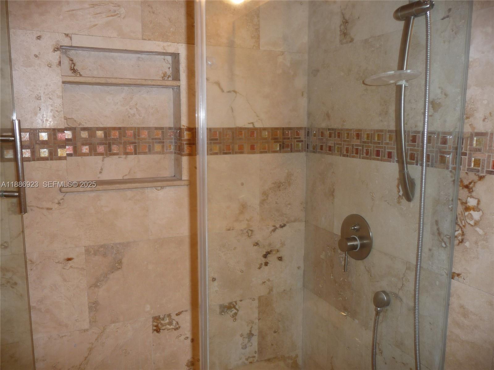 13904 Southwest 65th Terrace, Unit 8 Miami, FL 33183 - Photo 19 of 24 a bathroom with a shower