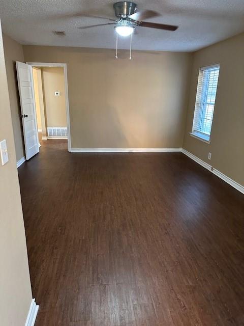 1516 Blackjack Road West Aubrey, TX 76227 - Photo 14 of 27 an empty room with wooden floor fan and windows