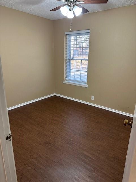 1516 Blackjack Road West Aubrey, TX 76227 - Photo 15 of 27 an empty room with wooden floor and windows