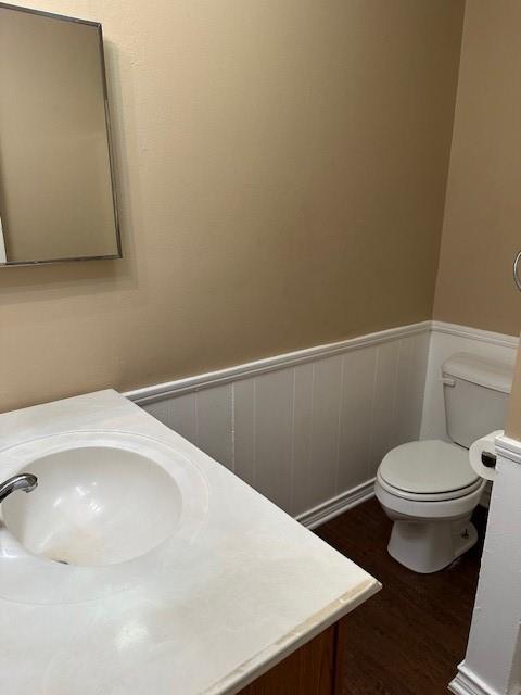1516 Blackjack Road West Aubrey, TX 76227 - Photo 18 of 27 a white toilet sitting next to a bathroom sink