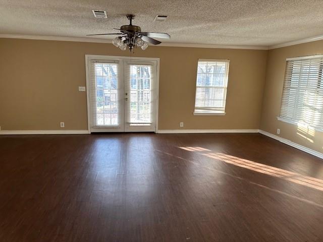 1516 Blackjack Road West Aubrey, TX 76227 - Photo 2 of 27 a view of an empty room with wooden floor and a window
