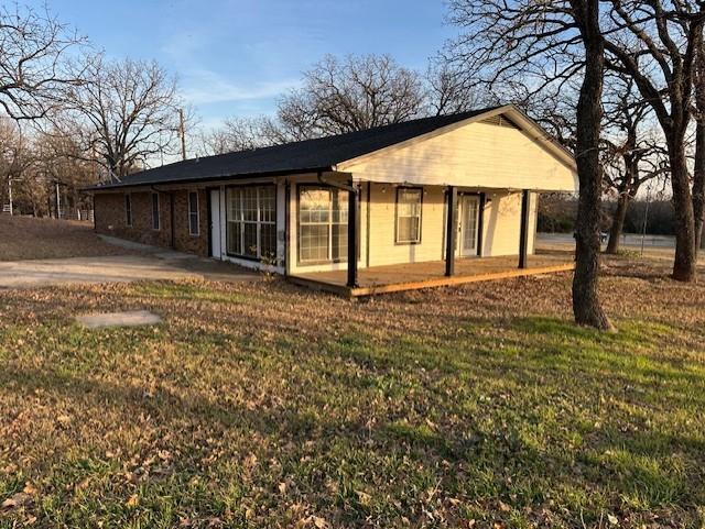 1516 Blackjack Road West Aubrey, TX 76227 - Photo 23 of 27 a front view of house with yard