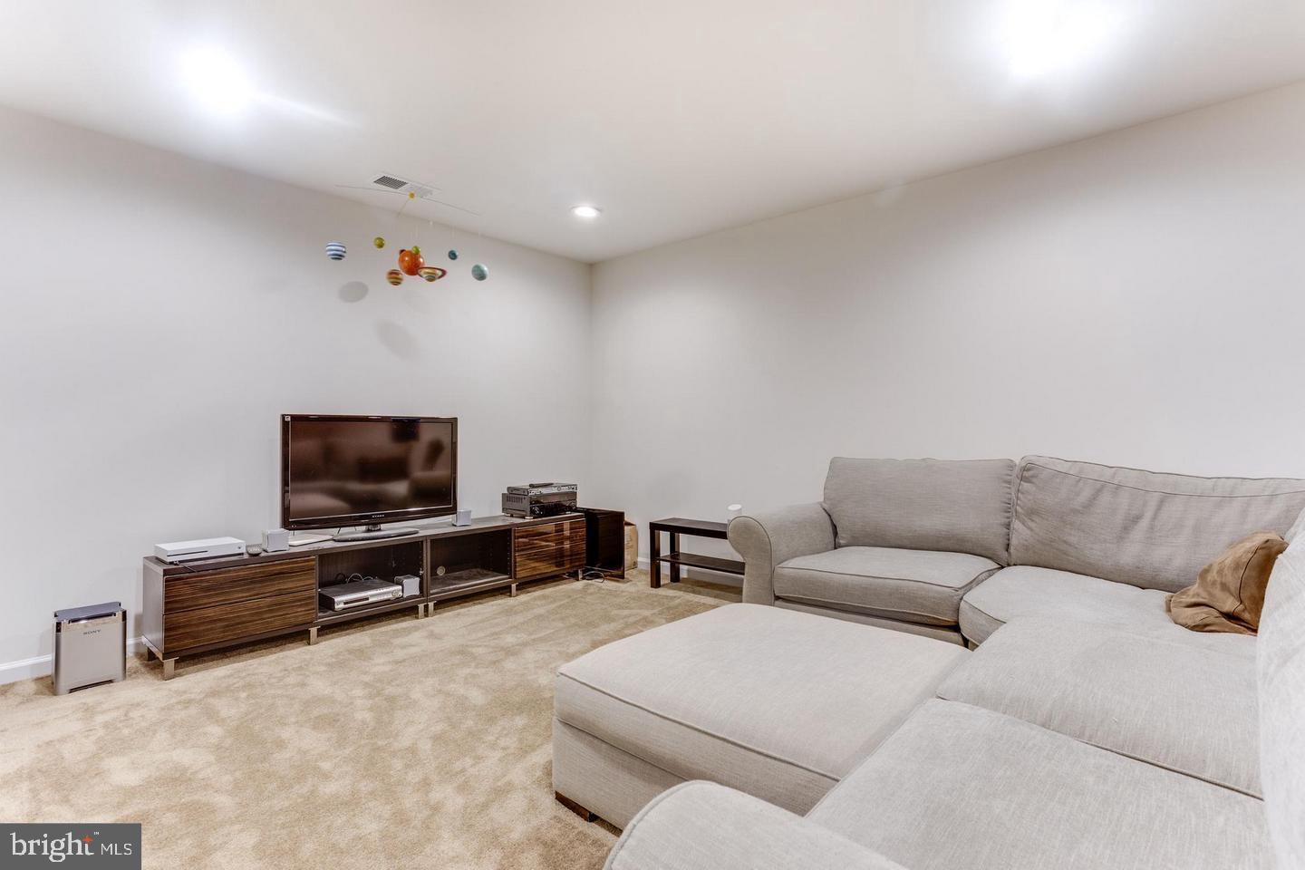 1005 Themis Street Southeast Leesburg, VA 20175 - Photo 26 of 32 Basement Rec Area