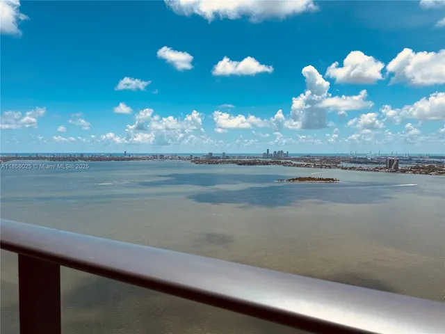 a view of a lake in the middle of a house