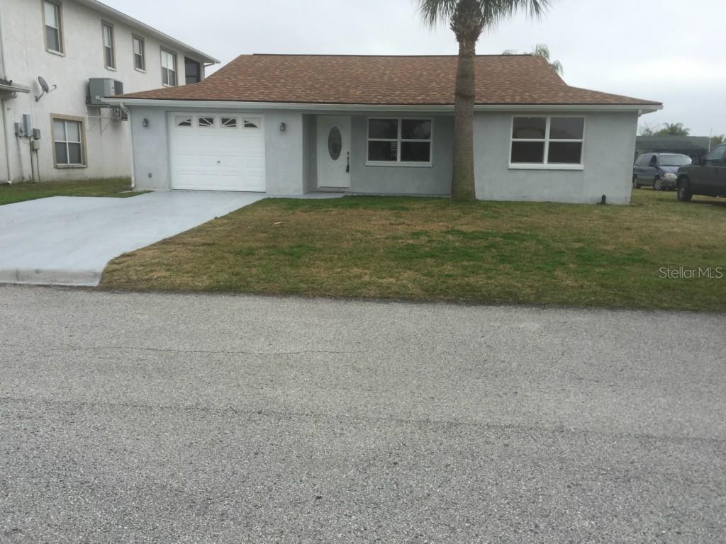 7400 Islander Lane Hudson, FL 34667 - Photo 1 of 1 Front