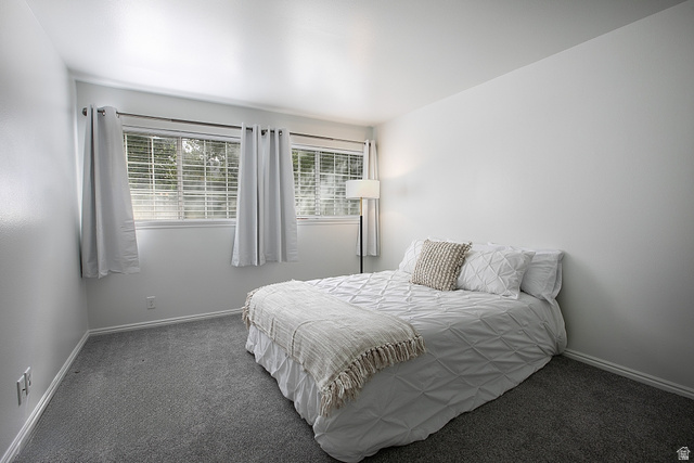 650 South Main Street, Unit 6103 Bountiful, UT 84010 - Photo 14 of 25 Primary Bedroom featuring carpet flooring