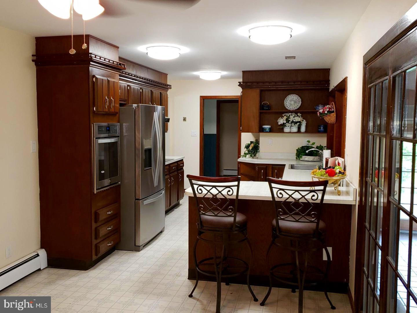 102 Gilbert Road Bordentown, NJ 08505 - Photo 1 of 28 a kitchen with stainless steel appliances granite countertop a refrigerator and a stove