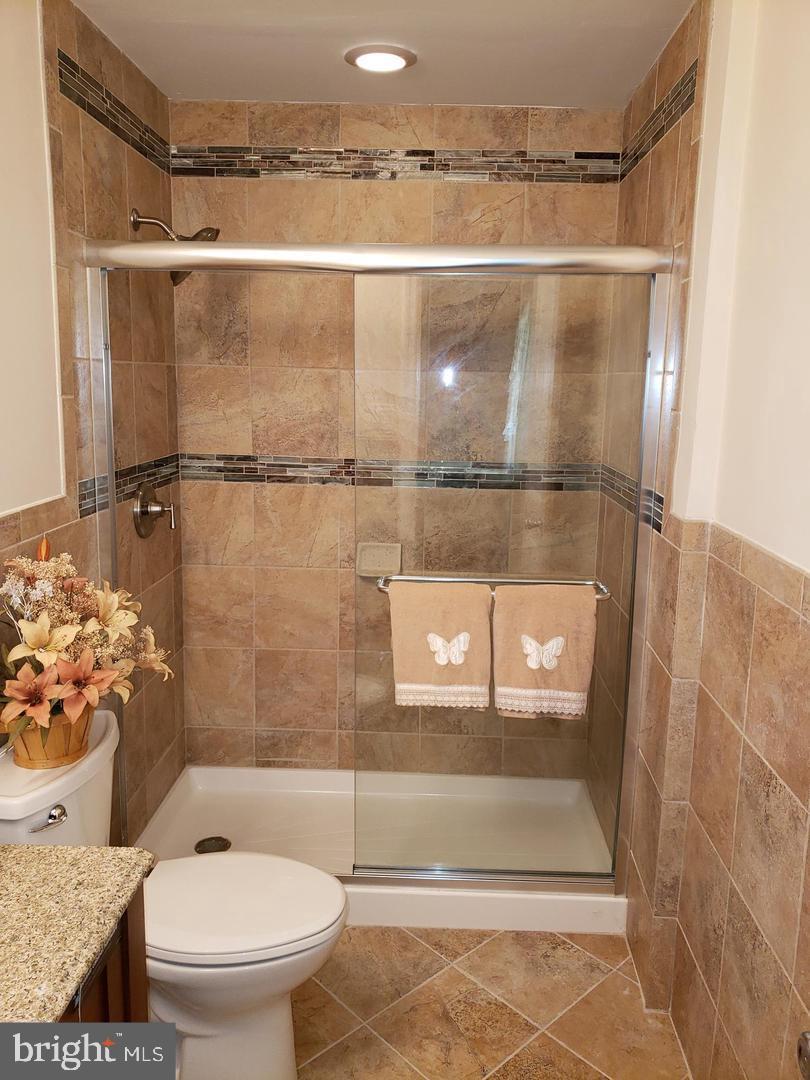 102 Gilbert Road Bordentown, NJ 08505 - Photo 17 of 28 a bathroom with a shower a toilet and a shower
