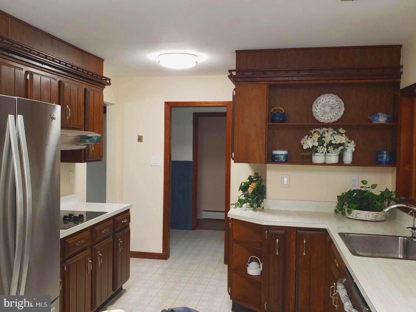 102 Gilbert Road Bordentown, NJ 08505 - Photo 6 of 28 a kitchen with stainless steel appliances granite countertop a refrigerator and a stove