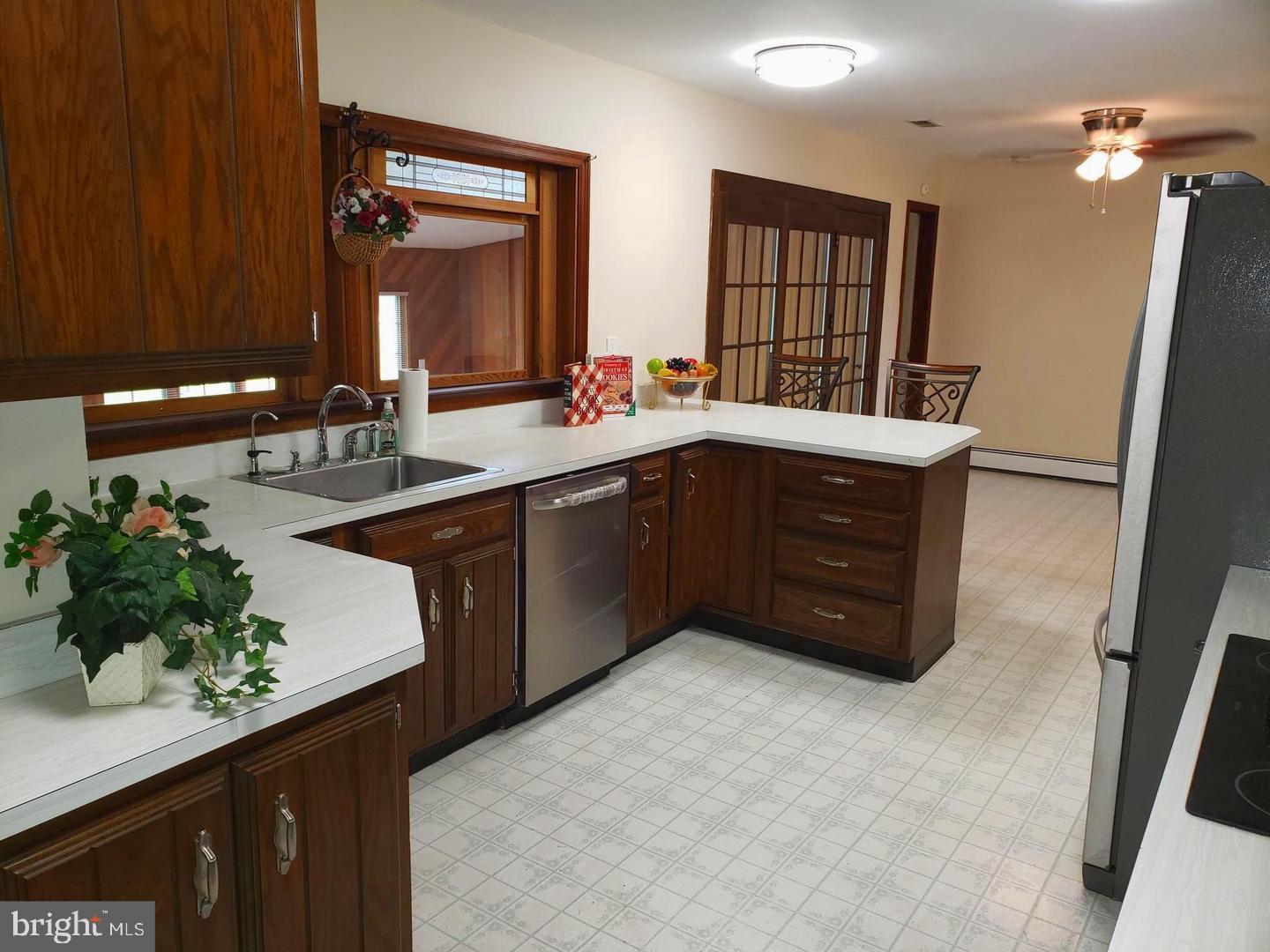 102 Gilbert Road Bordentown, NJ 08505 - Photo 7 of 28 a kitchen with sink and cabinets