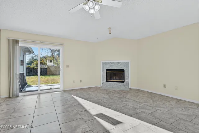 a kitchen with a white stove top oven and sink