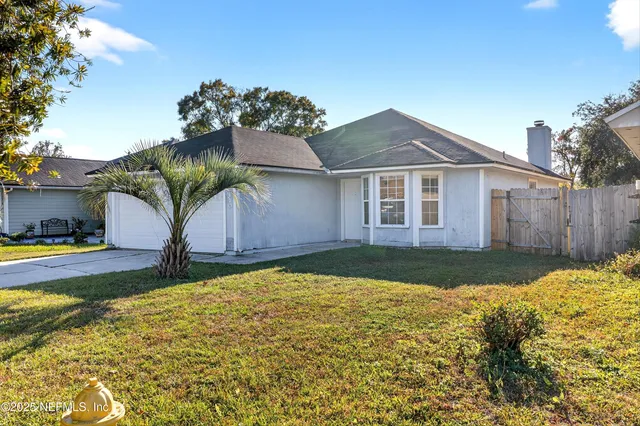 a house view with a garden space