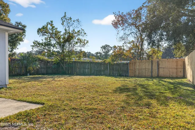 a picture of a bathroom with a shower