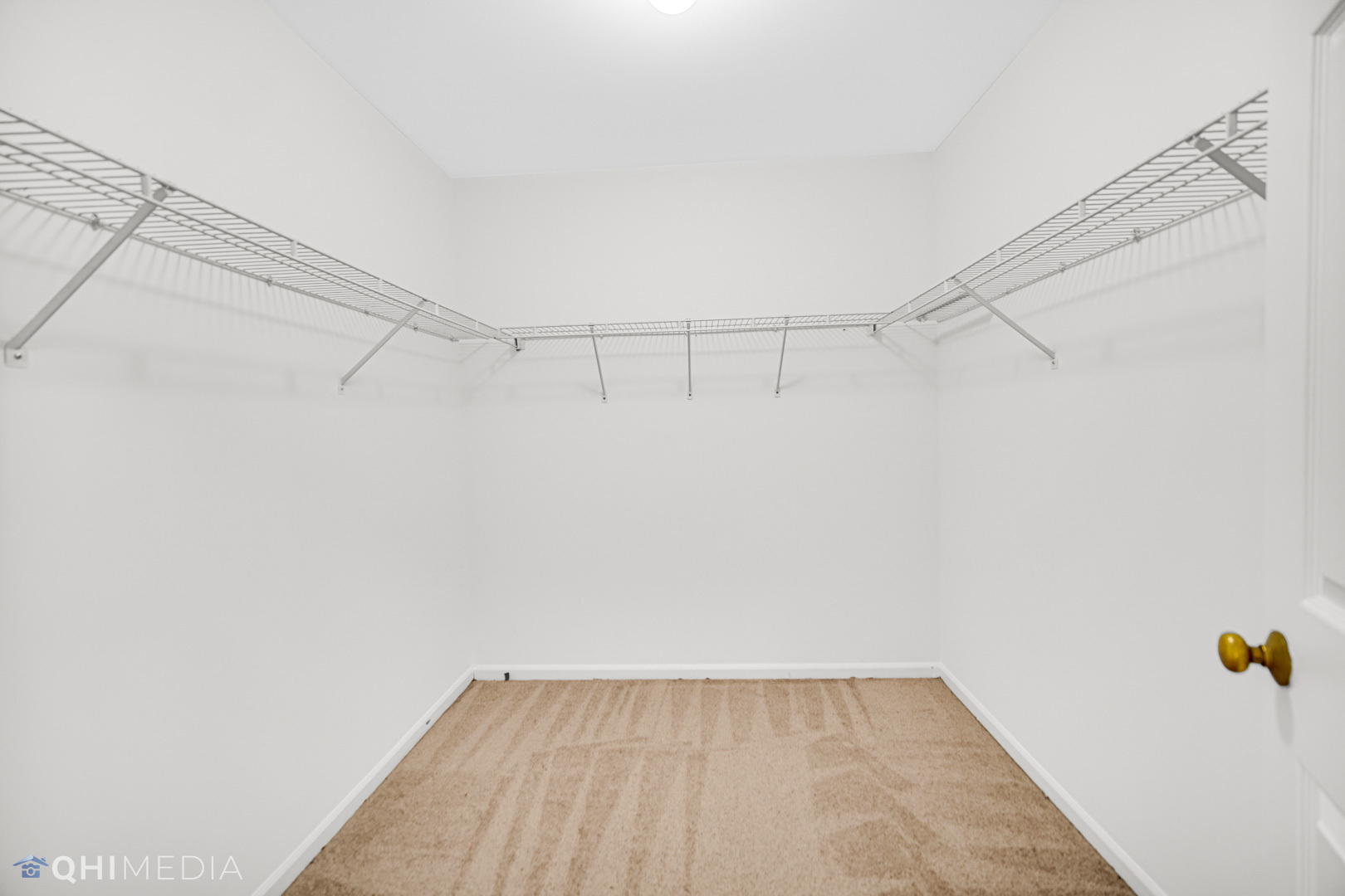 1123 Coldspring Road, Unit 1123 Elgin, IL 60120 - Photo 19 of 23 a view of a room with racks on the wall