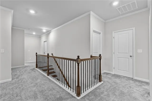 a view of a hallway with entryway