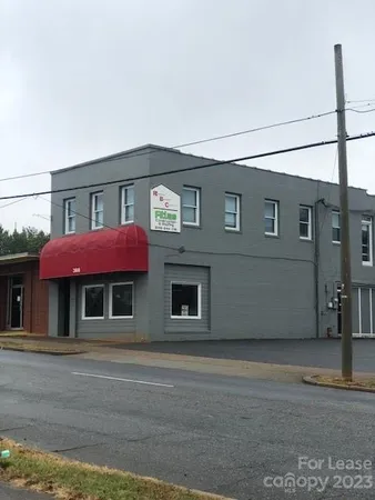 a front view of a house with a garage