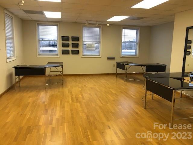 360 1st Avenue Southwest, Unit B Hickory, NC 28602 - Photo 5 of 9 a view of a room with gym equipment and windows