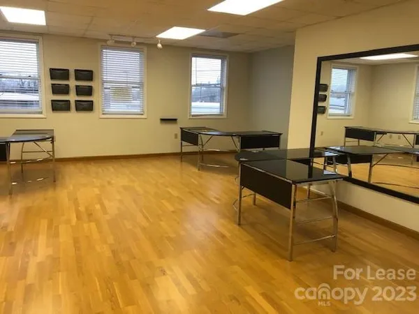 a living room with furniture and window