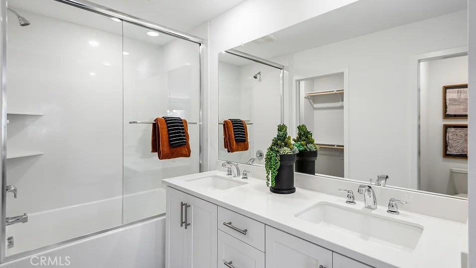 8421 Tapia Way Rancho Cucamonga, CA 91730 - Photo 11 of 24 a bathroom with a sink and a mirror