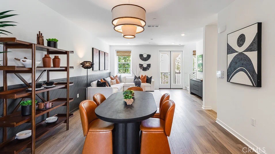 8421 Tapia Way Rancho Cucamonga, CA 91730 - Photo 6 of 24 a dining room with furniture and wooden floor
