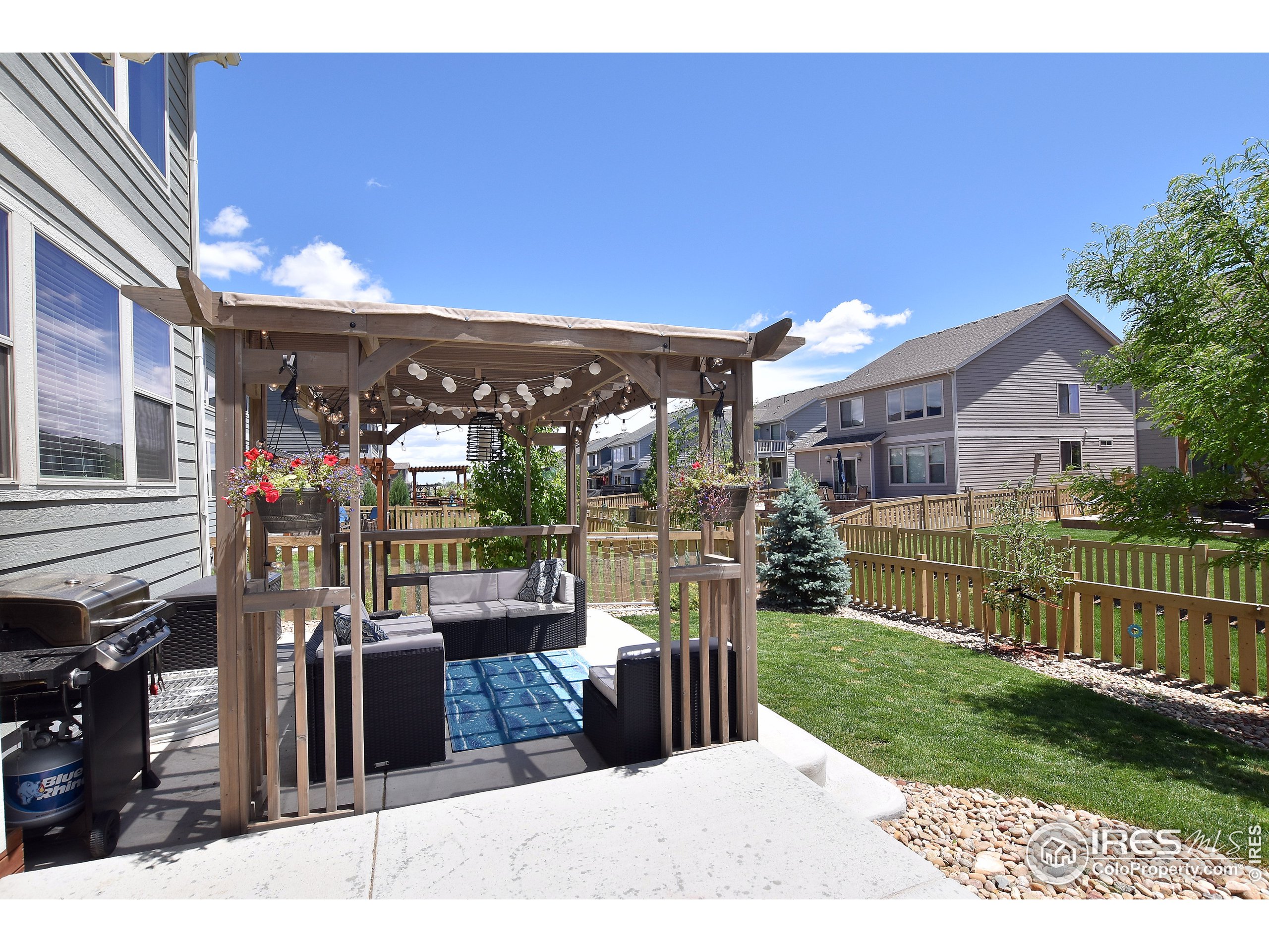 6559 Tombstone Ridge Road Timnath, CO 80547 - Photo 23 of 30 a view of a house with a porch