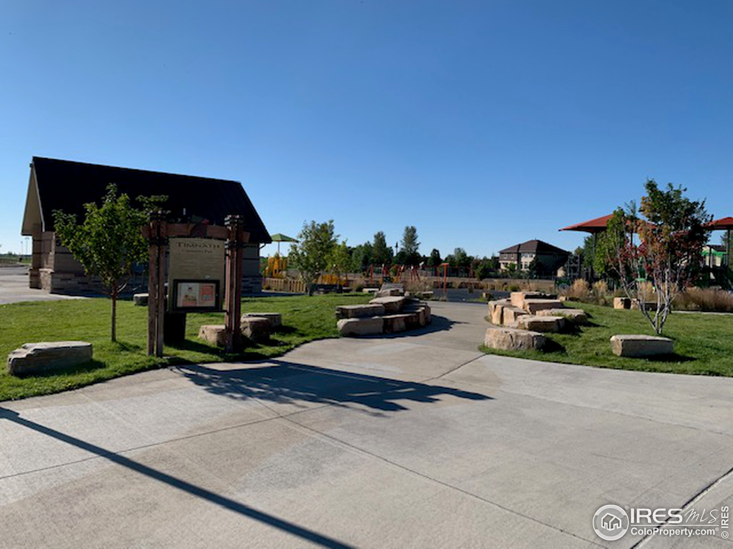 6559 Tombstone Ridge Road Timnath, CO 80547 - Photo 29 of 30 a view of a street with a cars parked