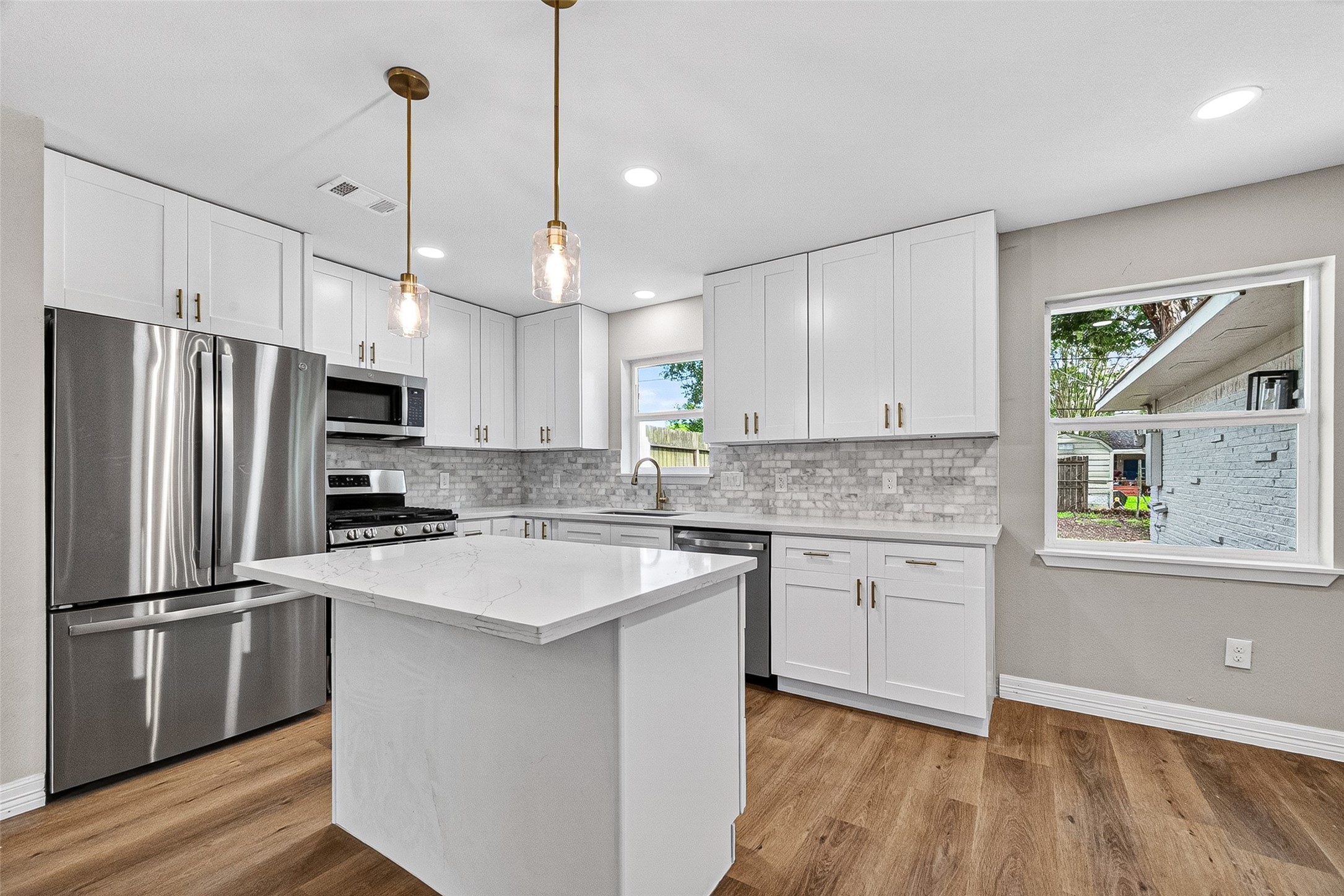 9723 Ebb Street Houston, TX 77089 - Photo 2 of 20 Beautifully updated kitchen with all new appliances and Quartz countertops.