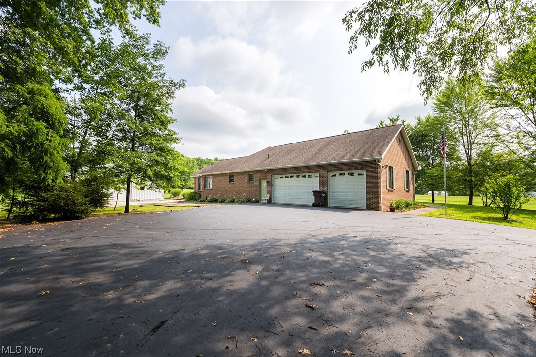 7055 Clark Road Atwater, OH 44201 - Photo 25 of 34 Spacious attached garage also offers access to basement.